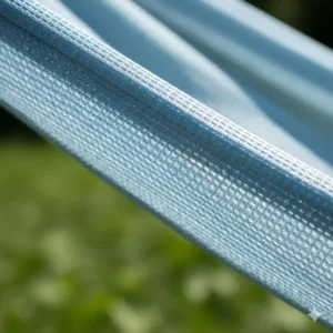 Detailansicht für atmungsaktive Hängematte Material mit Fokus auf die feine Gewebestruktur.